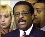 Linda-with-the-late-Johnnie-Cochran-at-a-Press-Conferene-Announcing-the-Settlemet-of-the-NJ-Turnpike-4